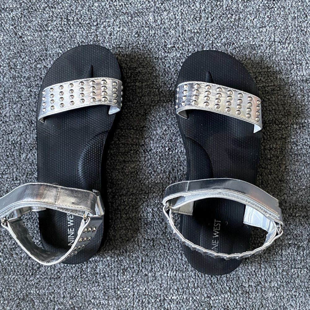 Nine West leather sandals; silver; black sole;